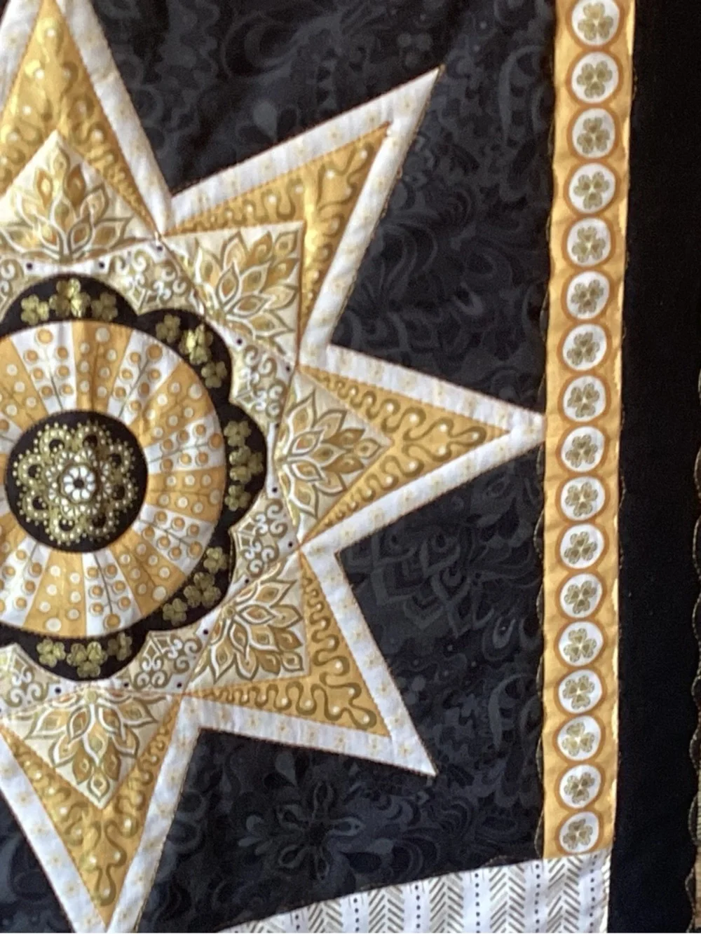 NWT. Gold and Black Star Lap Quilt